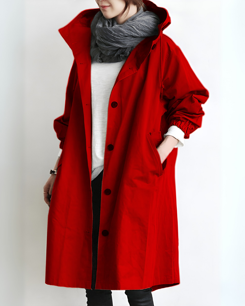 Loose fit women's hooded trench coat, offering elegant warmth. Single-breasted, long sleeve for versatile autumn/winter outerwear.