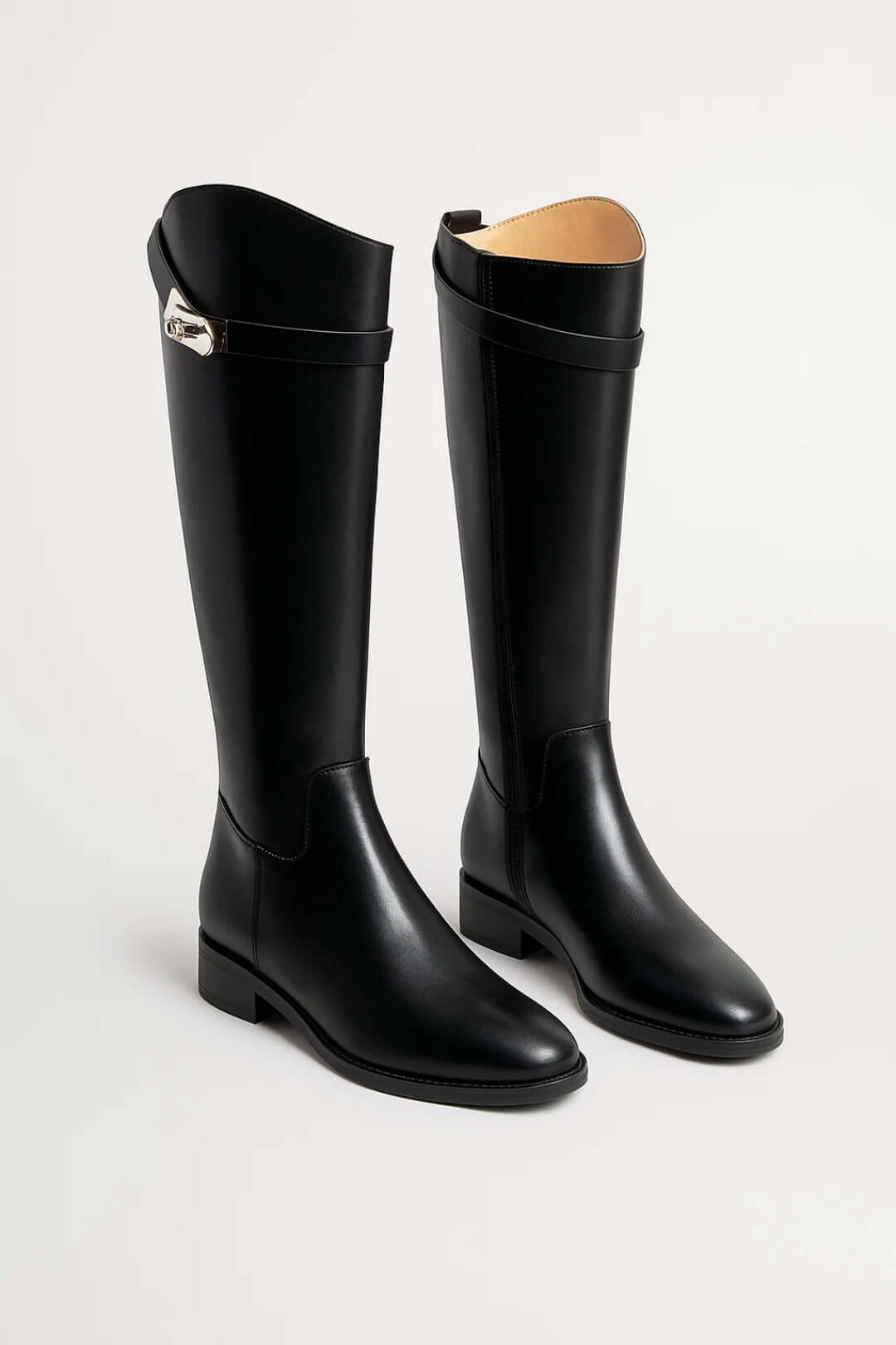 Elegant women's knee-high boots with stylish buckle detail. Perfect for fall & winter fashion.