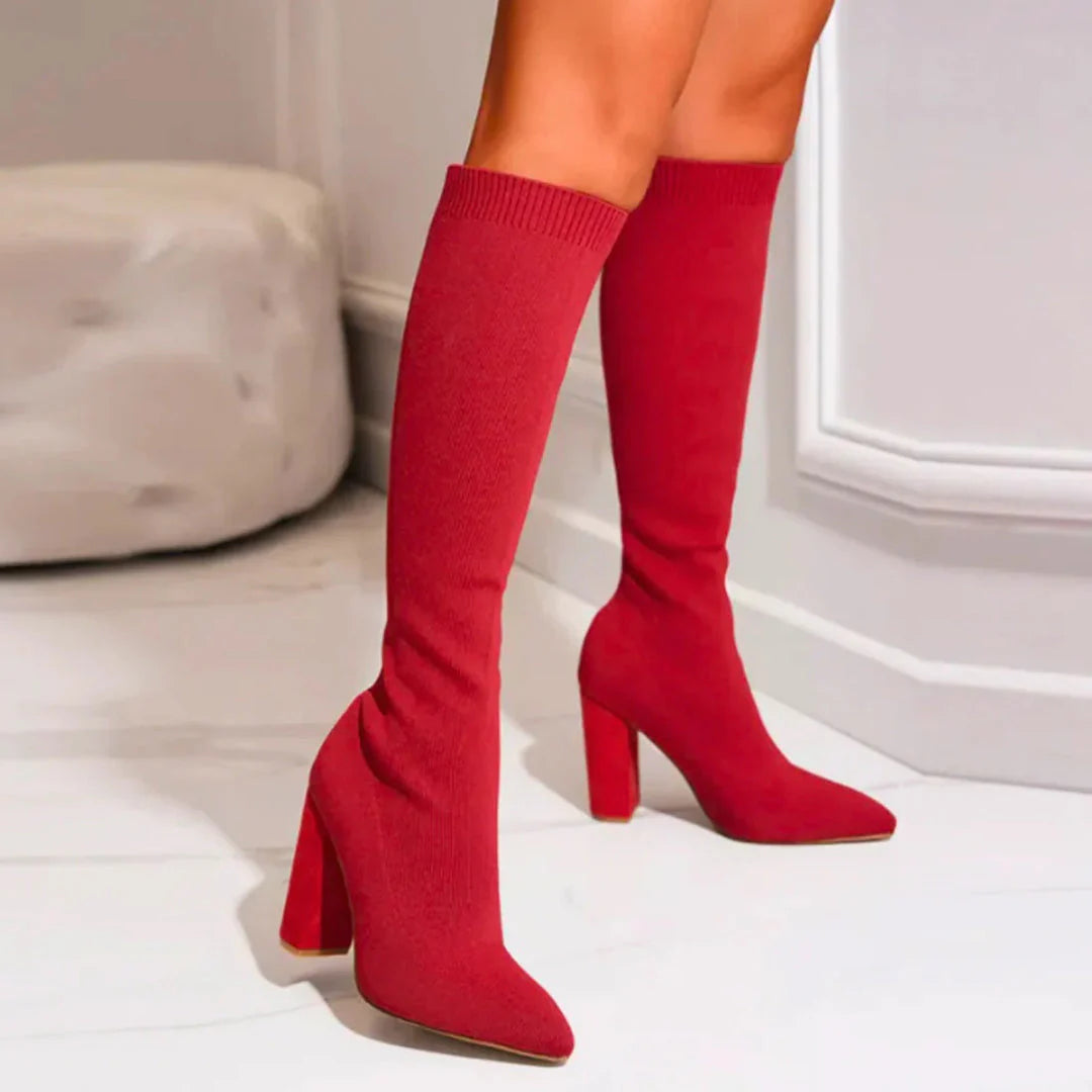 Sleek & comfortable women's knee-high stretch boots, providing an elegant silhouette with a block heel.