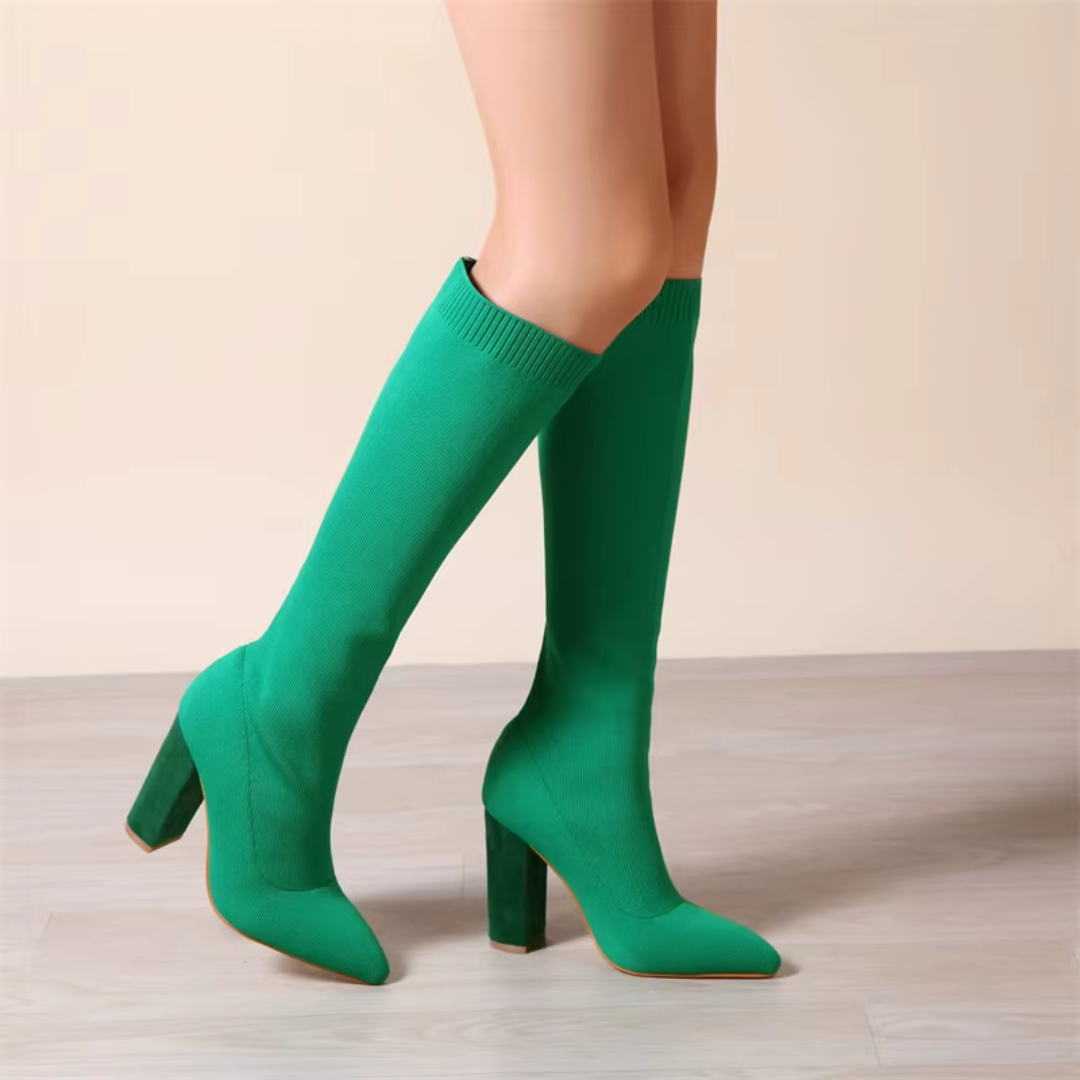 Chic slip-on stretch knee-high boots for women, offering a sleek, modern fit & elegant style.