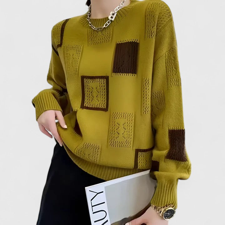 Cozy women's round neck long sleeve knit sweater. Sophisticated openwork design offers comfort for everyday styling.