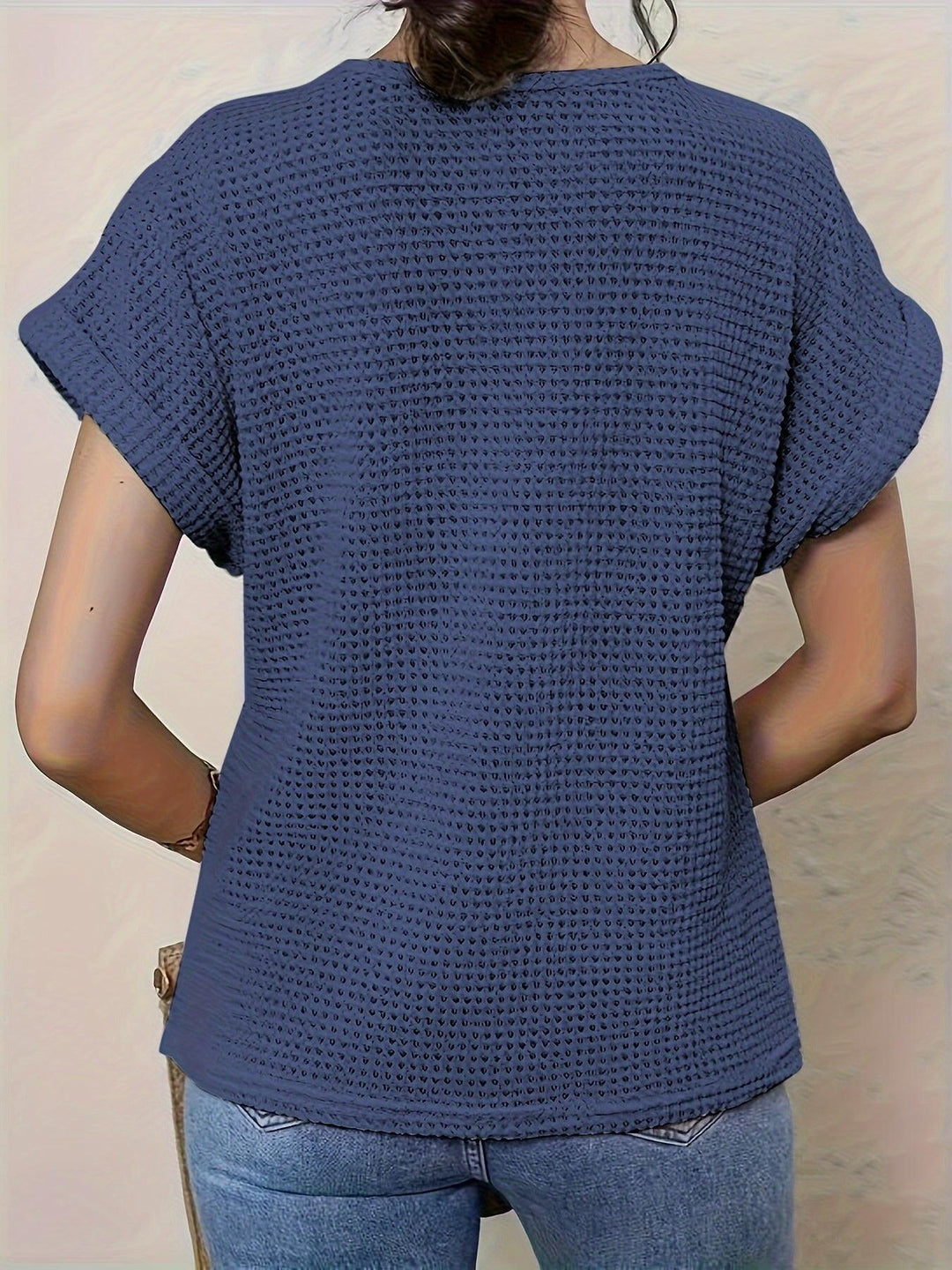 Elegant ladies knitwear top, comfortable & versatile for office attire or casual chic with intricate details.