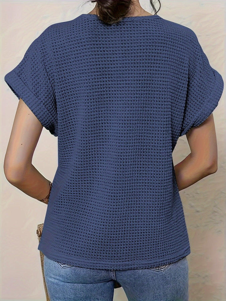 Elegant ladies knitwear top, comfortable & versatile for office attire or casual chic with intricate details.