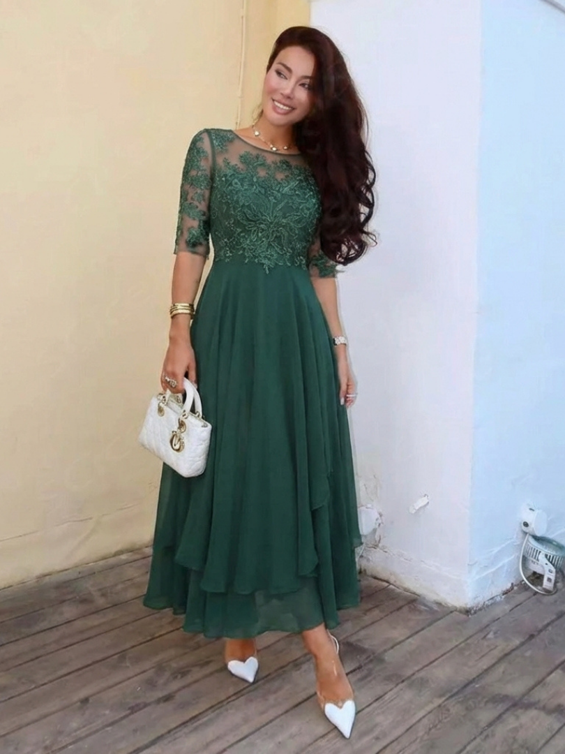 Pink elegant women's midi dress, lace bodice, three-quarter sleeves, for parties & formal wear.