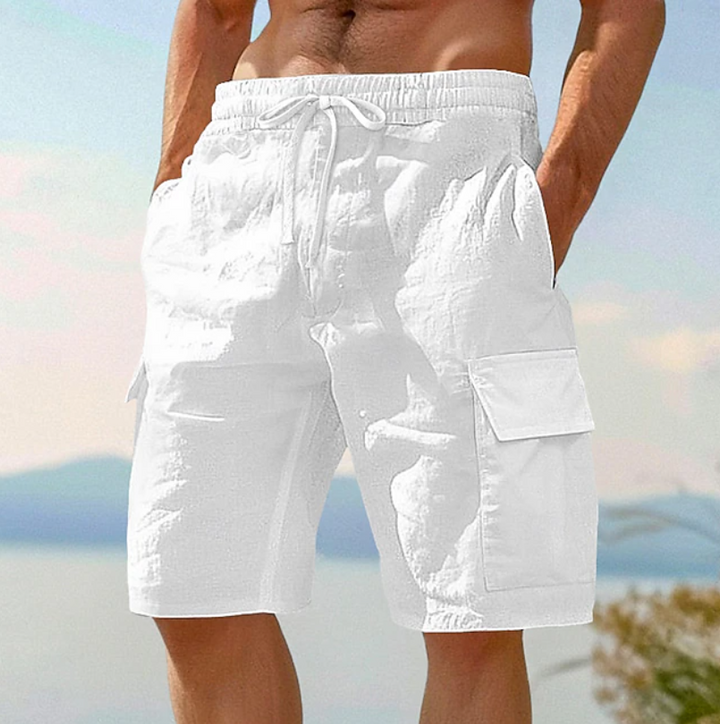 Elegant women's lace shorts with practical side pockets, perfect for summer fashion and versatile styling.