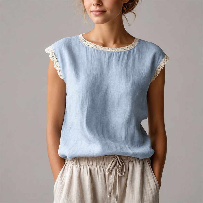 Elegant women's lace trim blouse with a comfortable relaxed fit, perfect for smart casual or everyday wear.