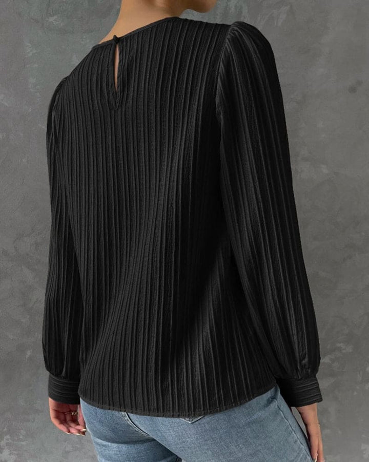 Chic workwear women's blouse, featuring a comfortable round neck and graceful lantern sleeves.