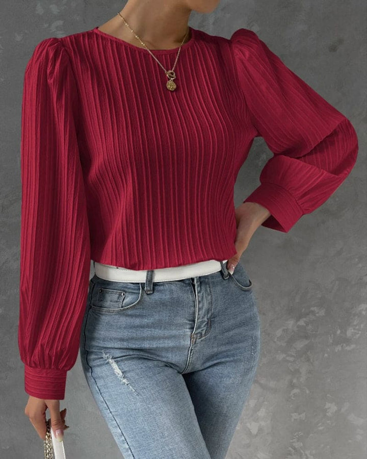 Casual elegant women's lantern sleeve blouse with a round neck, ideal for modern everyday style.
