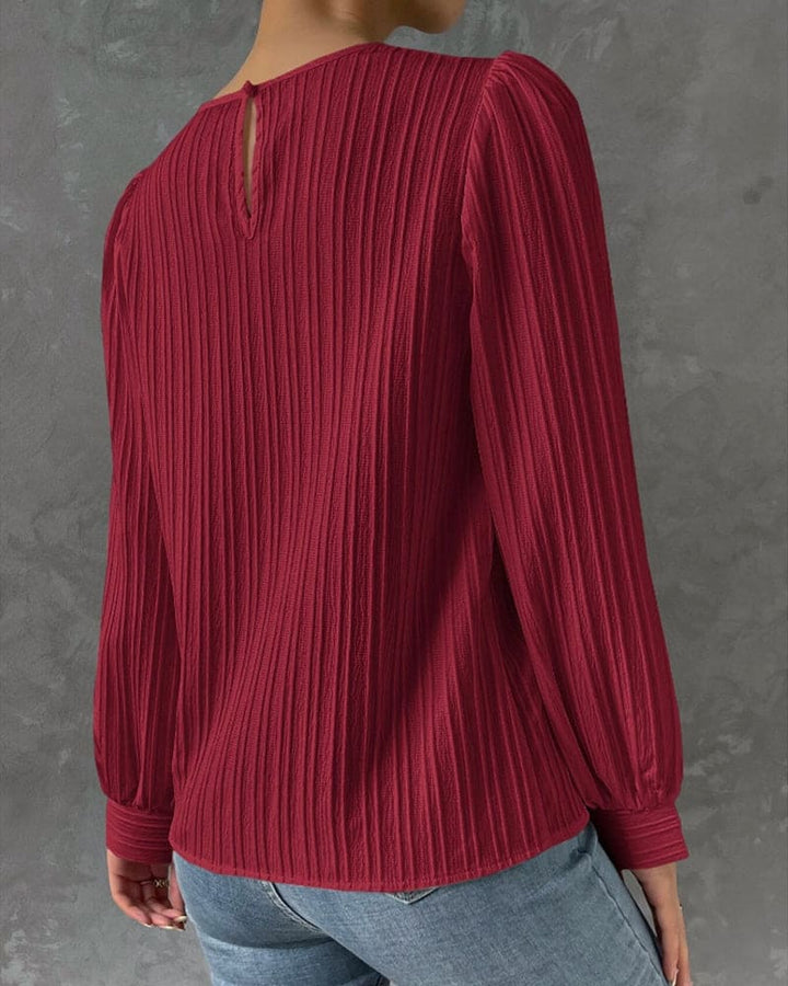 Women's versatile long sleeve top, a round neck blouse with fashionable lantern sleeves.