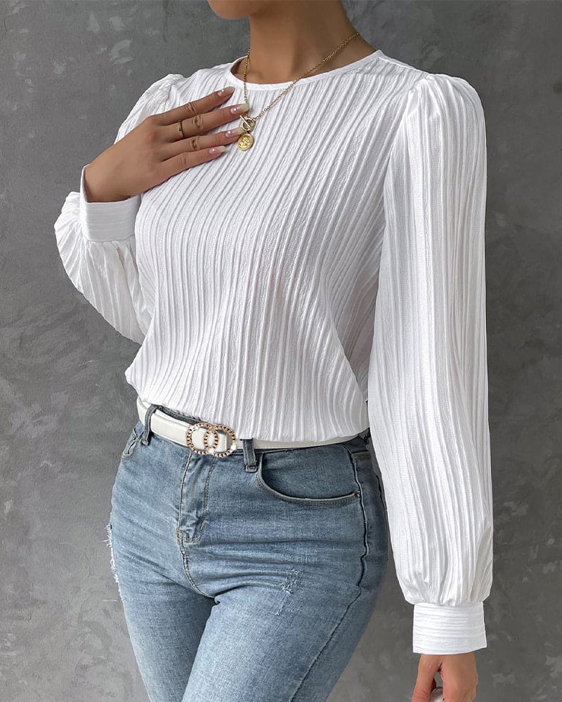 Stylish workwear women's lantern sleeve blouse, a long sleeve top with an elegant round neck.