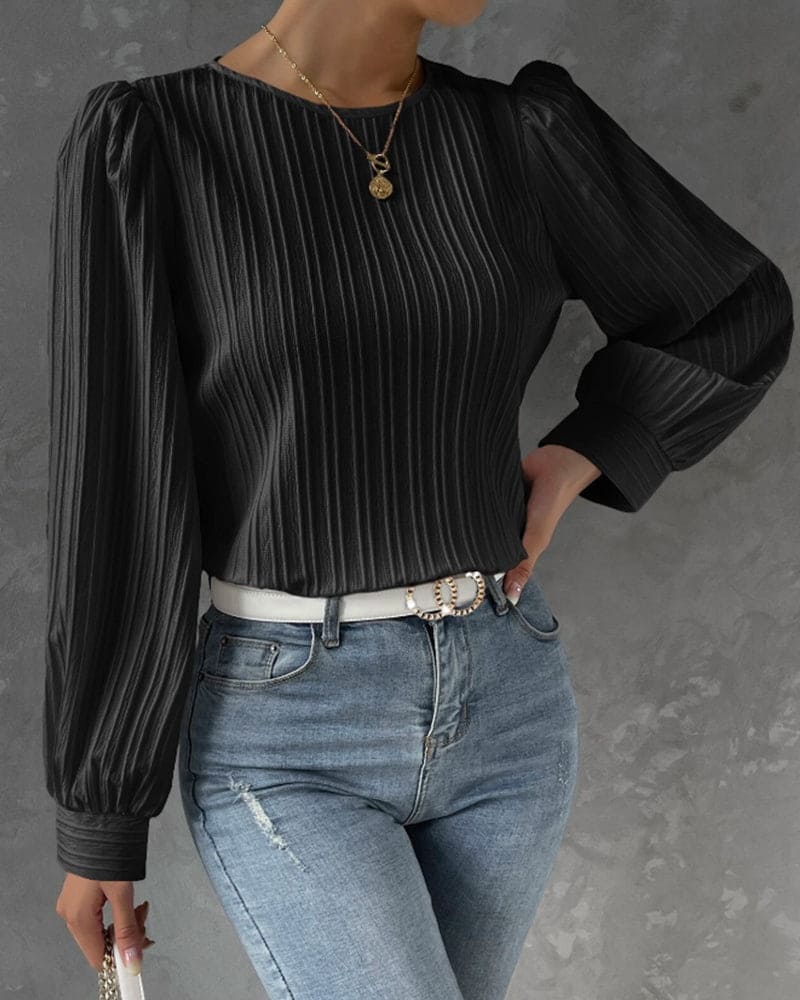 Elegant women's top, a versatile round neck blouse with stylish lantern sleeves for any occasion.