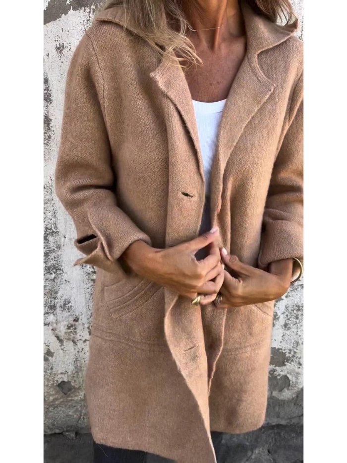 Fashionable women's lapel jacket, button-front design, offering an elegant & versatile winter style.