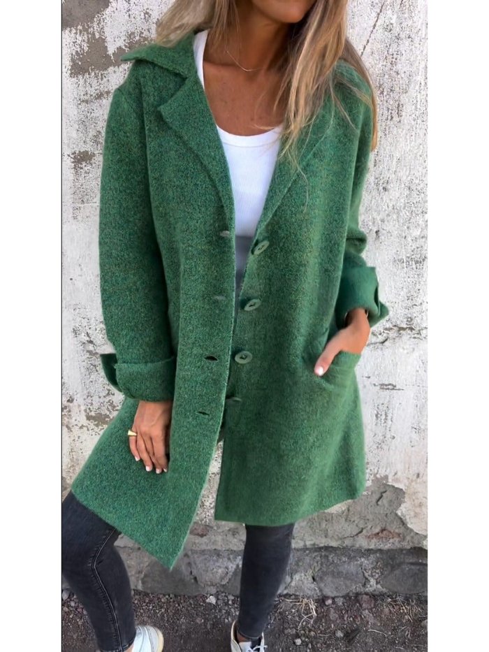 Autumn fashion: elegant women's long coat with lapel collar and stylish button-front design.