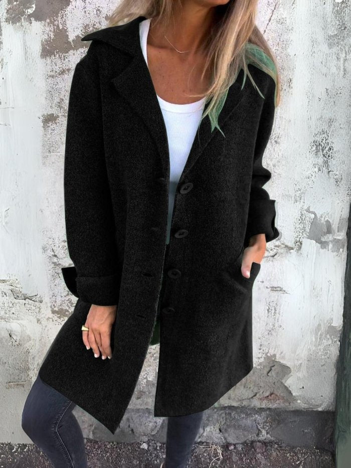 Elegant women's outerwear: a stylish lapel coat with a button-front for a classic autumn & winter look.