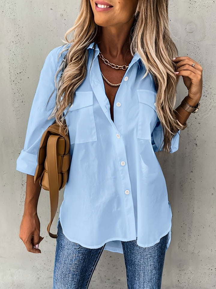 Stylish women's long-sleeve lapel collar shirt. Button-down design, suitable as an elegant blouse or casual top.