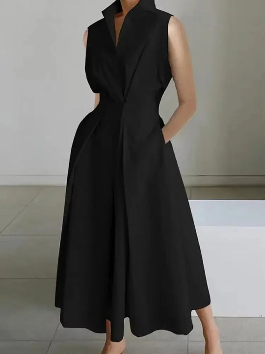 Versatile women's sleeveless A-line midi dress with pockets, ideal for workwear or comfortable summer fashion.