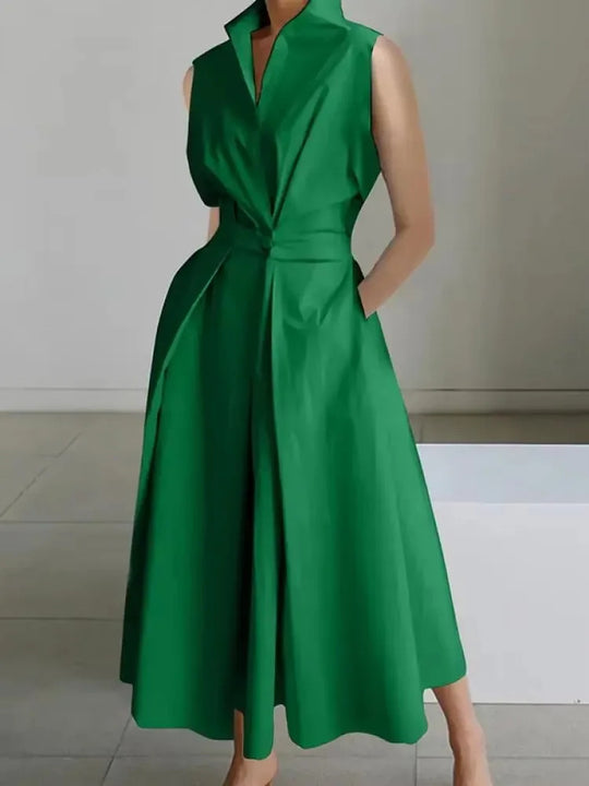 New women's sleeveless lapel midi dress, A-line, featuring practical pockets. Elegant for work or summer fashion.