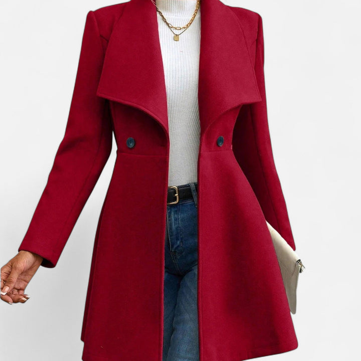 Elegant women's lapel winter coat, long & tailored, for stylish warmth in cold weather.