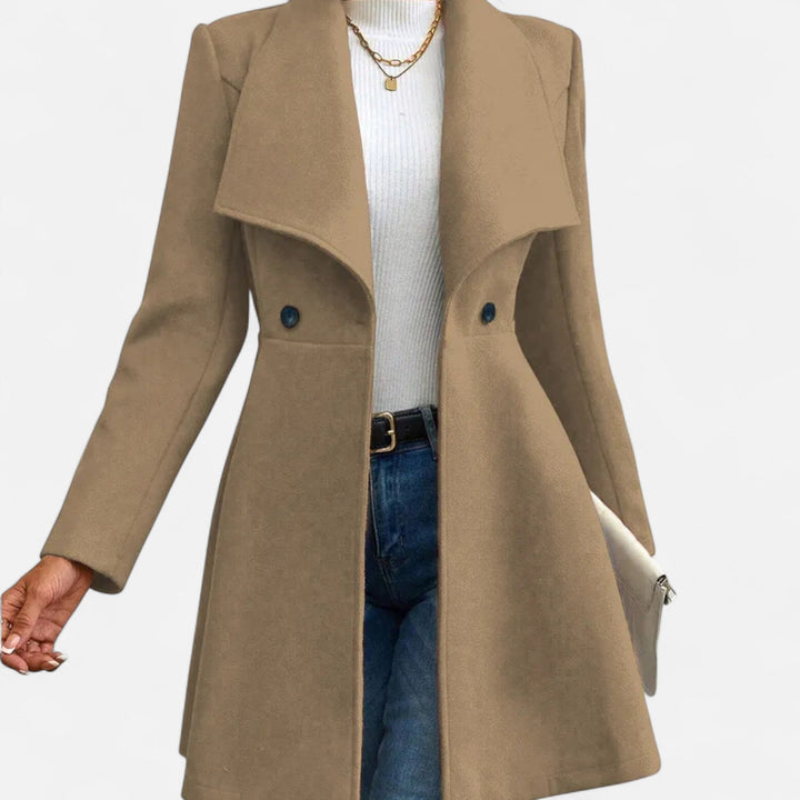 Tailored women's elegant winter coat, a warm and fashionable lapel outerwear piece for stylish cold days.