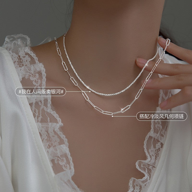Minimalist multi-layer chain necklace for women, stylish silver-tone jewelry, versatile accessory.