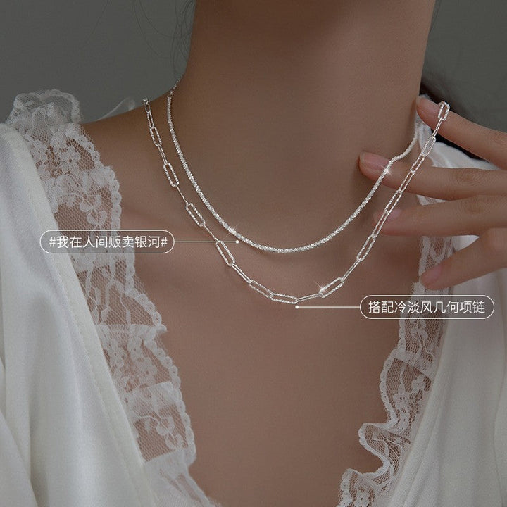 Minimalist multi-layer chain necklace for women, stylish silver-tone jewelry, versatile accessory.