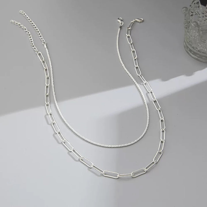 Simple yet elegant layered chain necklace, a must-have women's fashion accessory in silver.