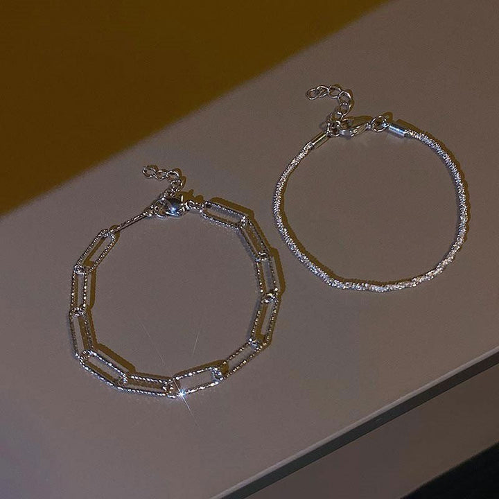 Stylish women's layered chain necklace, adjustable gold/silver-tone, minimalist & versatile jewelry.