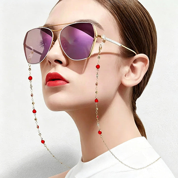 Multi-strand gold tone layered necklace with colorful crystals, a sophisticated women's fashion statement.