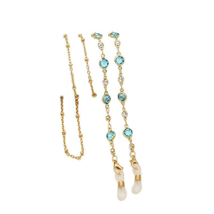 Women's gold tone layered necklace with vibrant crystals, perfect elegant fashion accessory for any outfit.