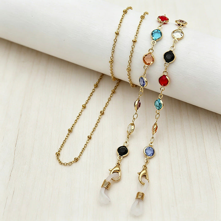 Sophisticated women's layered crystal necklace, gold-toned with a burst of colorful, sparkling gems.