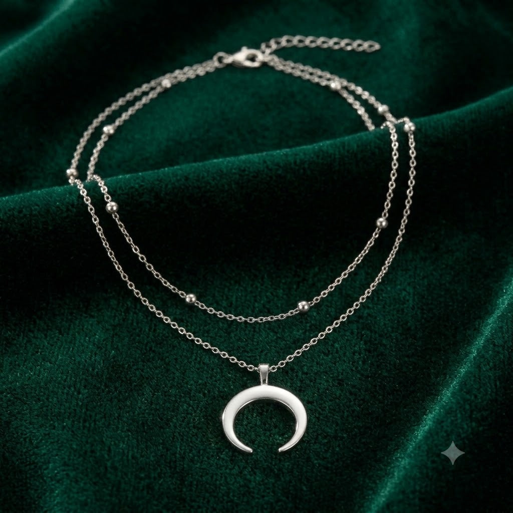 Stylish women's layered necklace featuring a minimalist crescent moon pendant. Versatile fashion jewelry for her.
