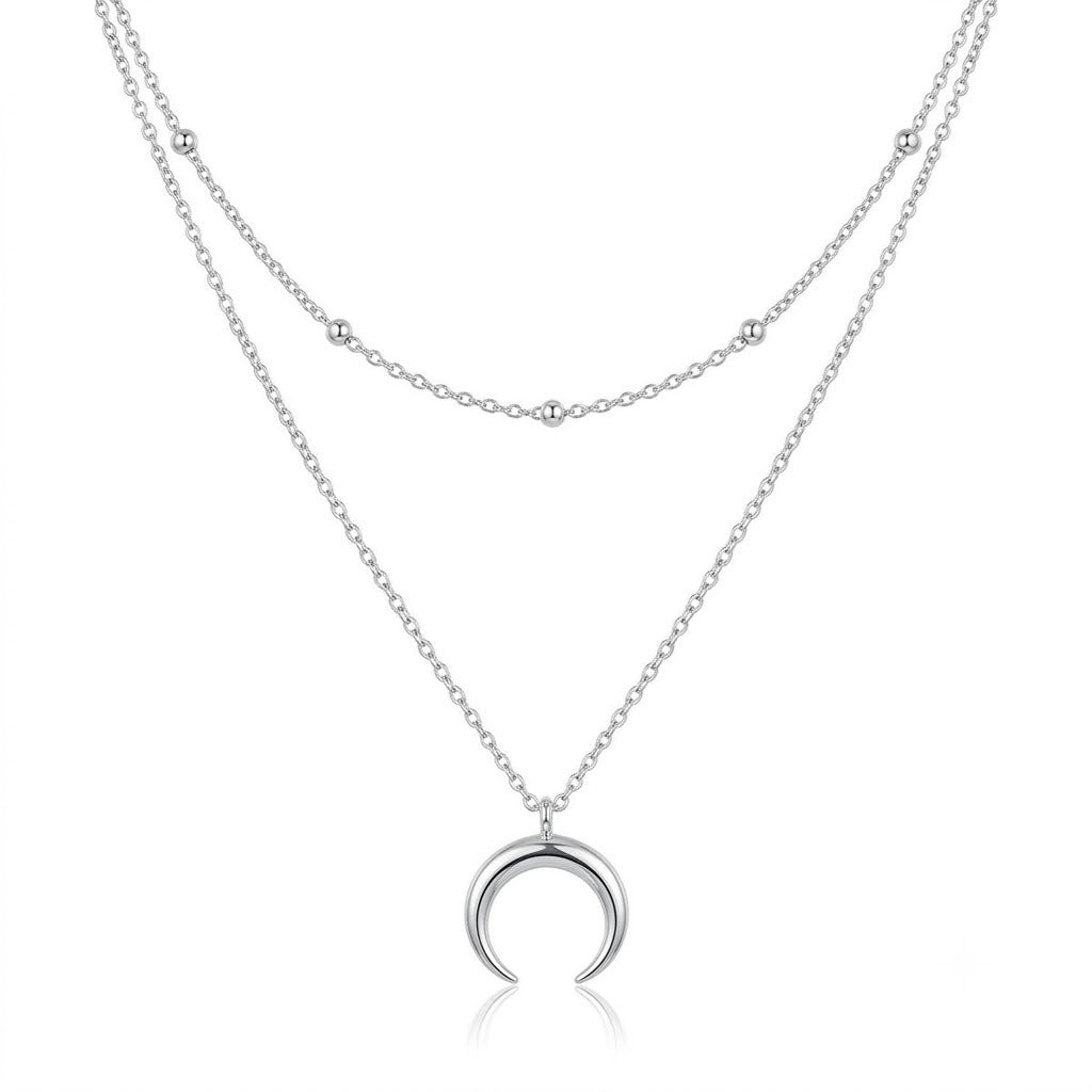Beautiful layered moon pendant necklace for women. Delicate celestial gold-tone jewelry, a thoughtful gift for her.