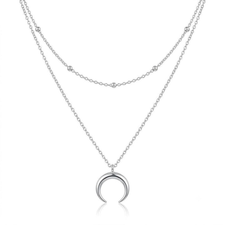 Beautiful layered moon pendant necklace for women. Delicate celestial gold-tone jewelry, a thoughtful gift for her.
