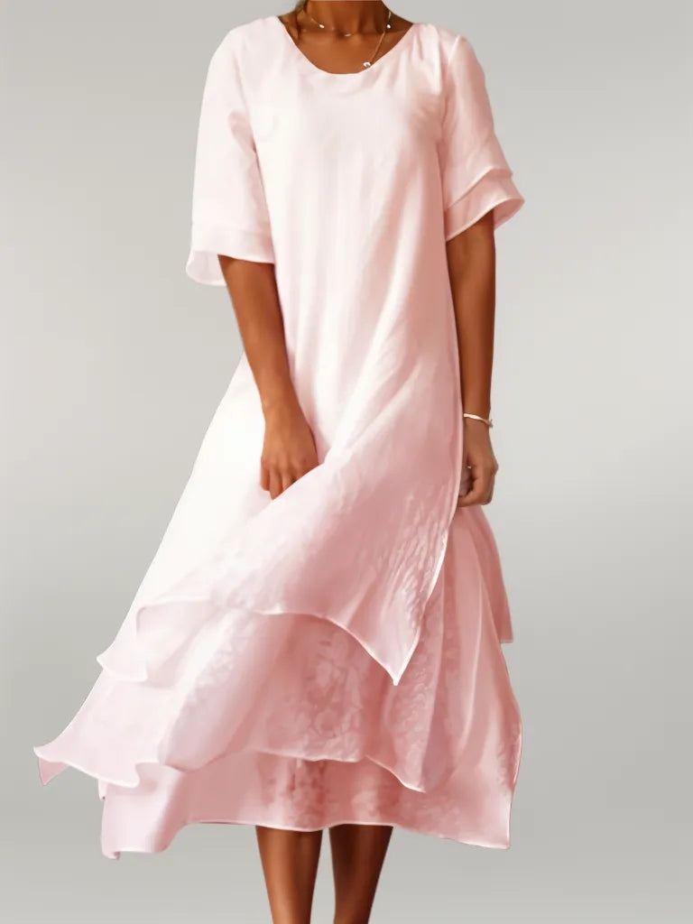 Elegant women's layered midi dress. Flowy design, perfect for summer casual or special occasions.