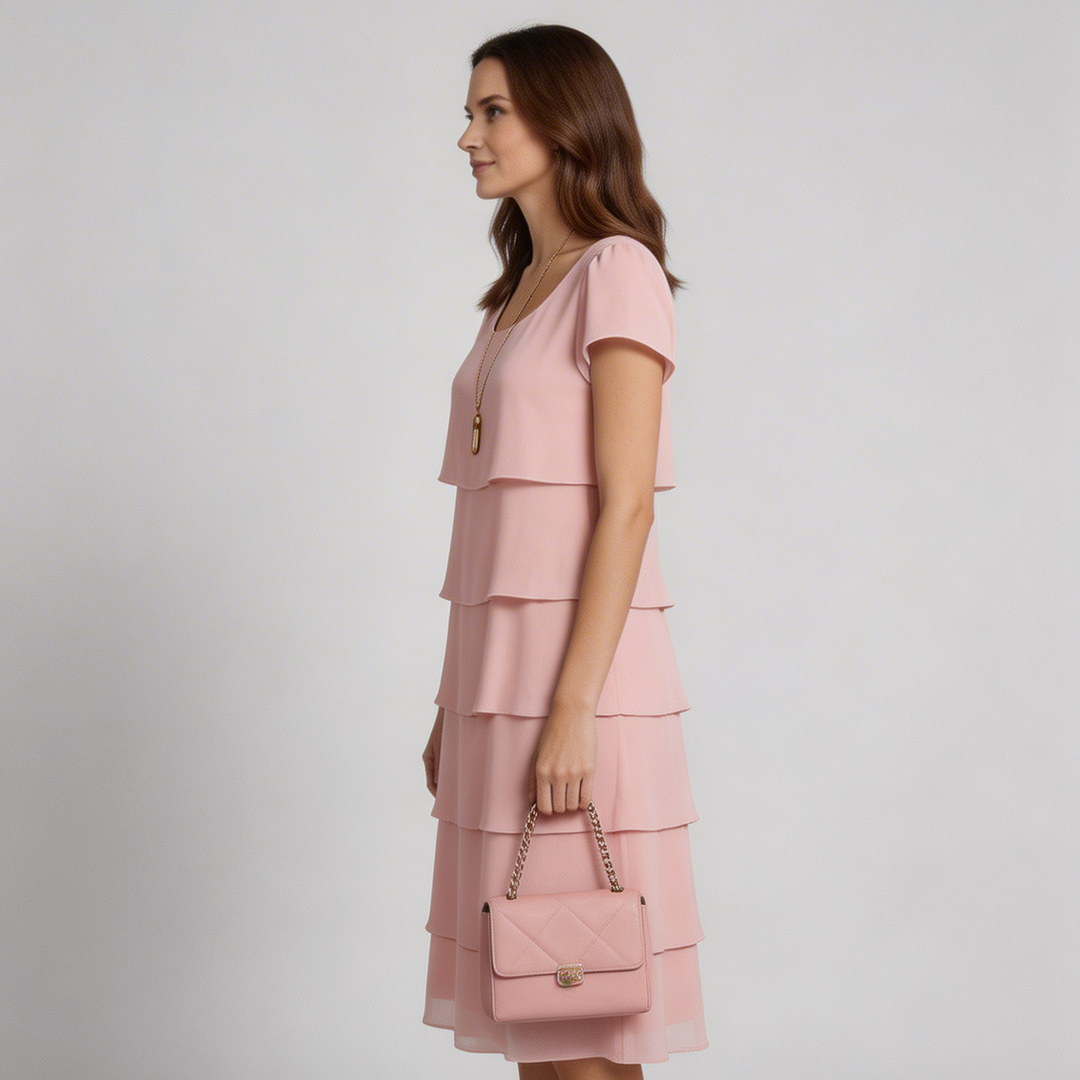 Versatile women's layered midi dress. Elegant short sleeve design for comfortable, sophisticated wear, suitable for special occasions.
