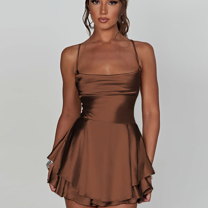Trendy women's sleeveless mini dress, perfect for a chic party or evening look.