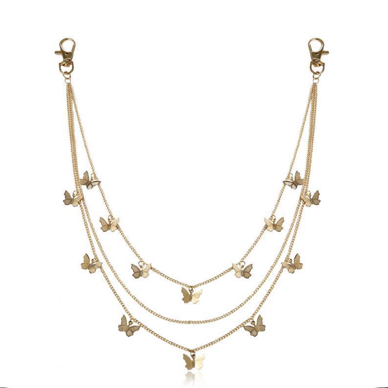 Modern women's layered butterfly necklace with delicate chains, a trendy and adjustable gold fashion accessory.