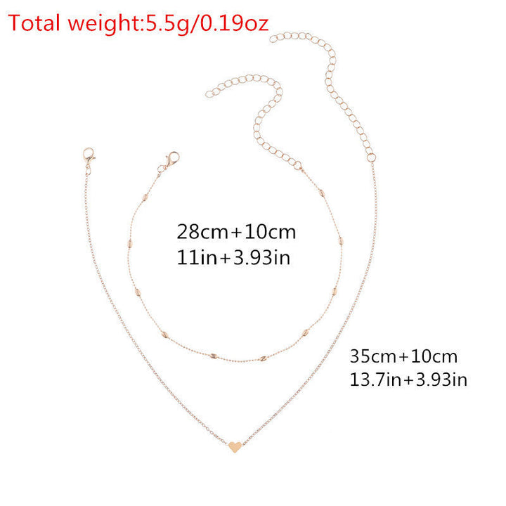 Delicate layered heart charm necklace for women, a perfect elegant gift. Available in gold and silver.