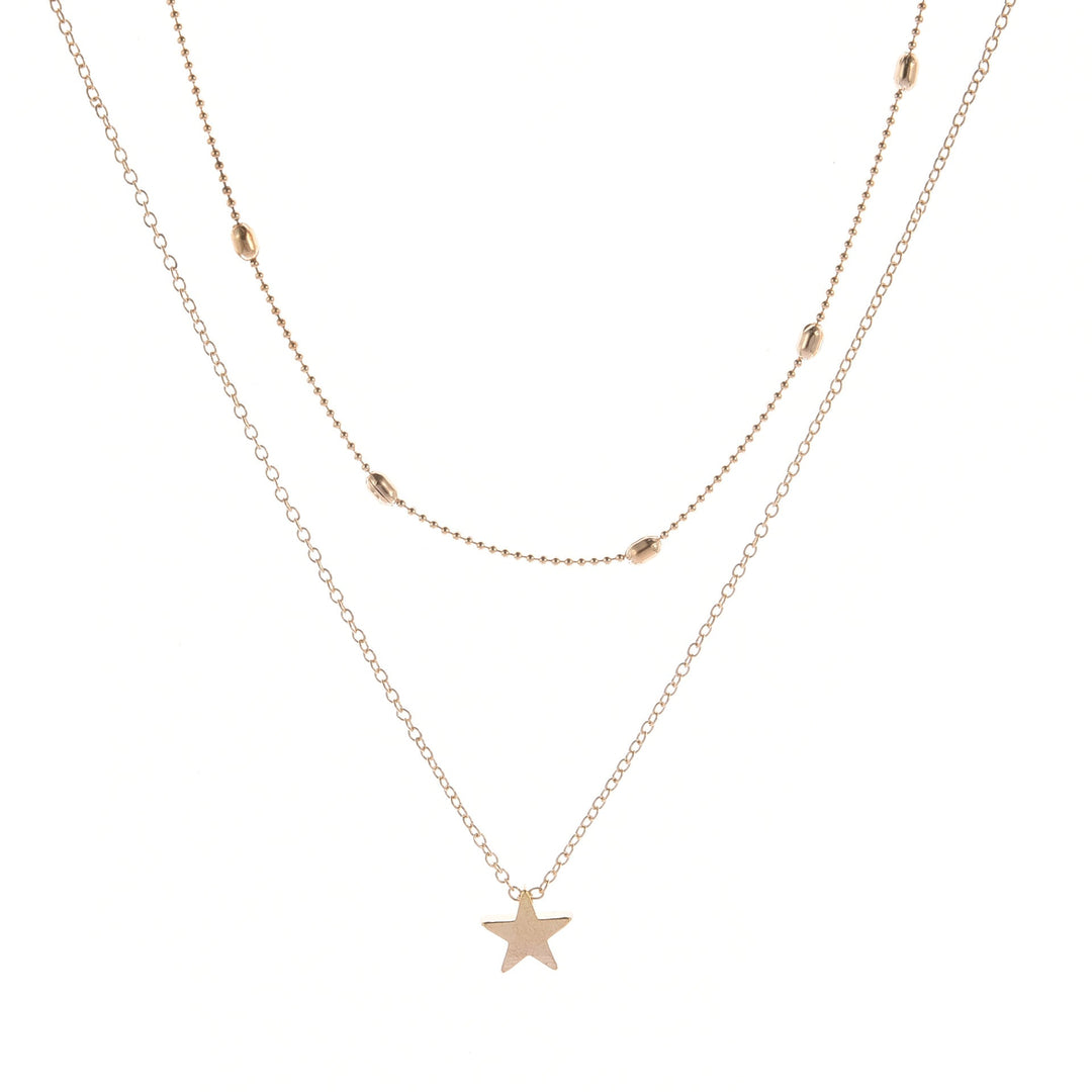 Beautiful layered necklace with a charming heart pendant for women, available in gold and silver finishes.
