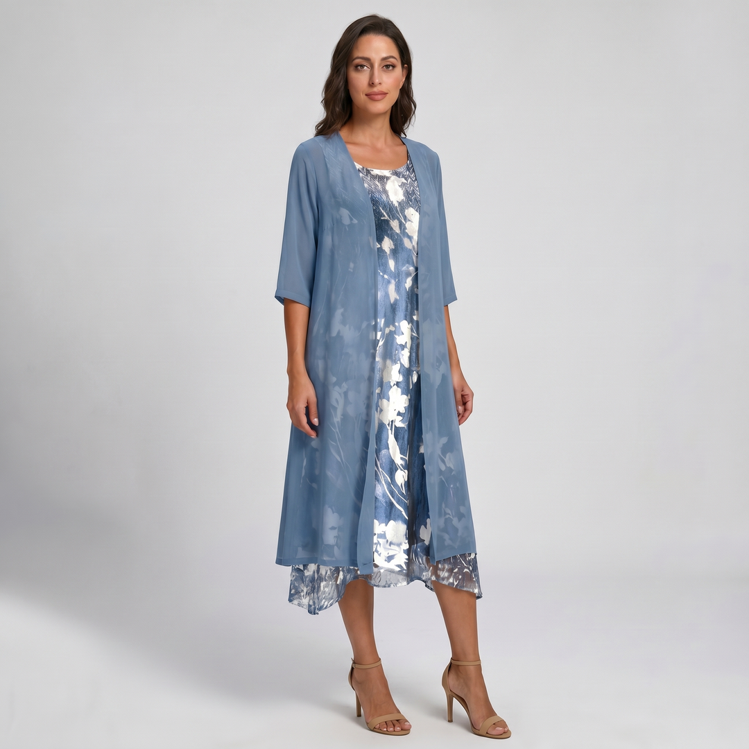 Feminine open front layered midi dress with a vibrant floral print, ideal for versatile summer outfits.