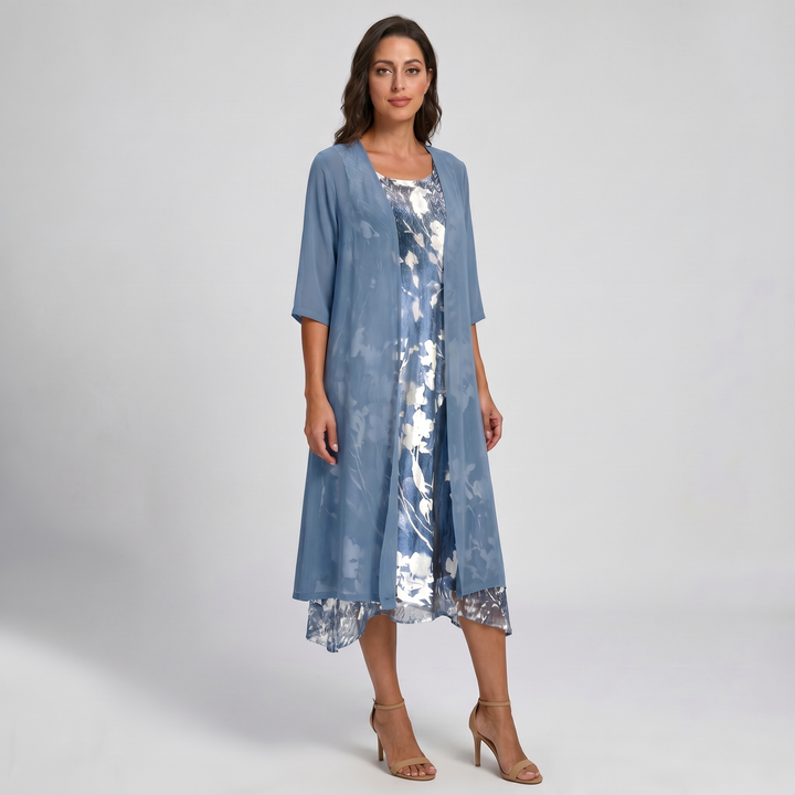 Feminine open front layered midi dress with a vibrant floral print, ideal for versatile summer outfits.