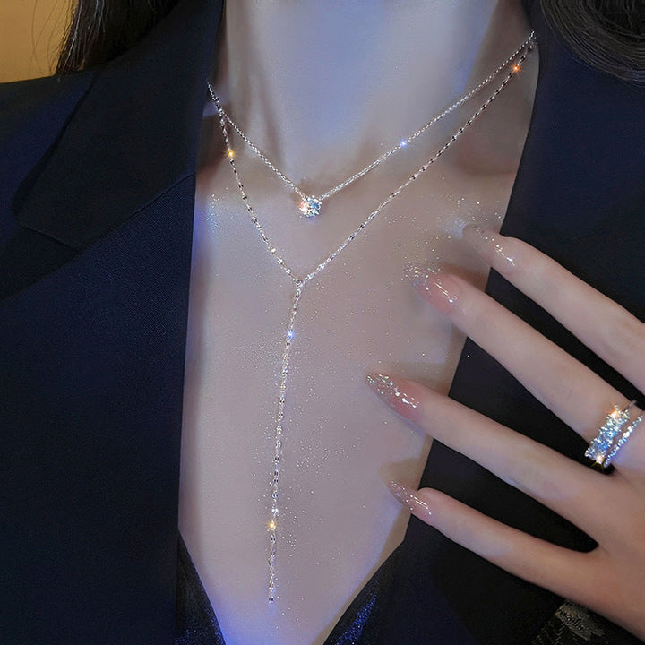 Fashionable minimalist layered necklace for women with a delicate charm pendant, perfect everyday accessory.