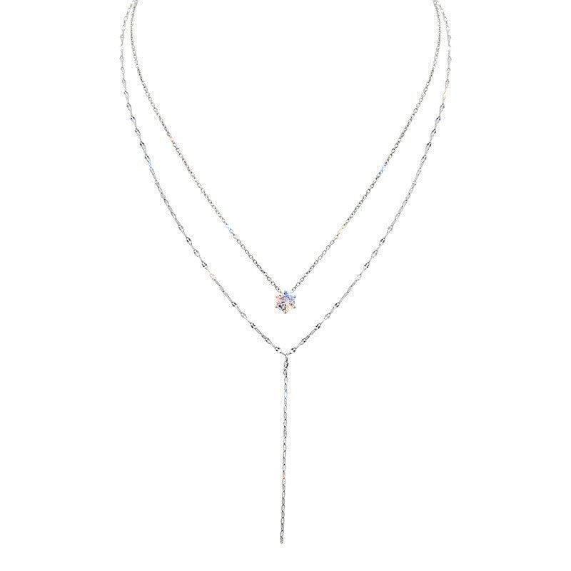 Delicate women's layered necklace with an elegant pendant charm. Versatile fashion jewelry for any outfit.