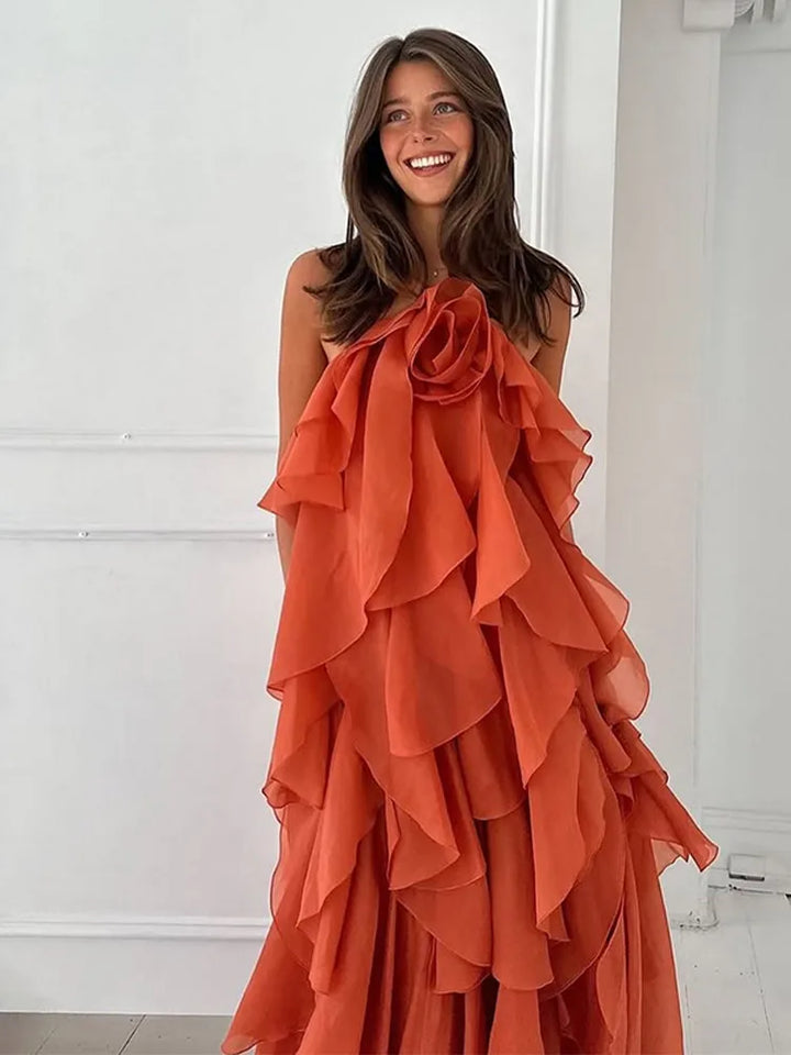 Elegant women's layered ruffle maxi dress with delicate floral detail, perfect for summer holidays & beachwear.