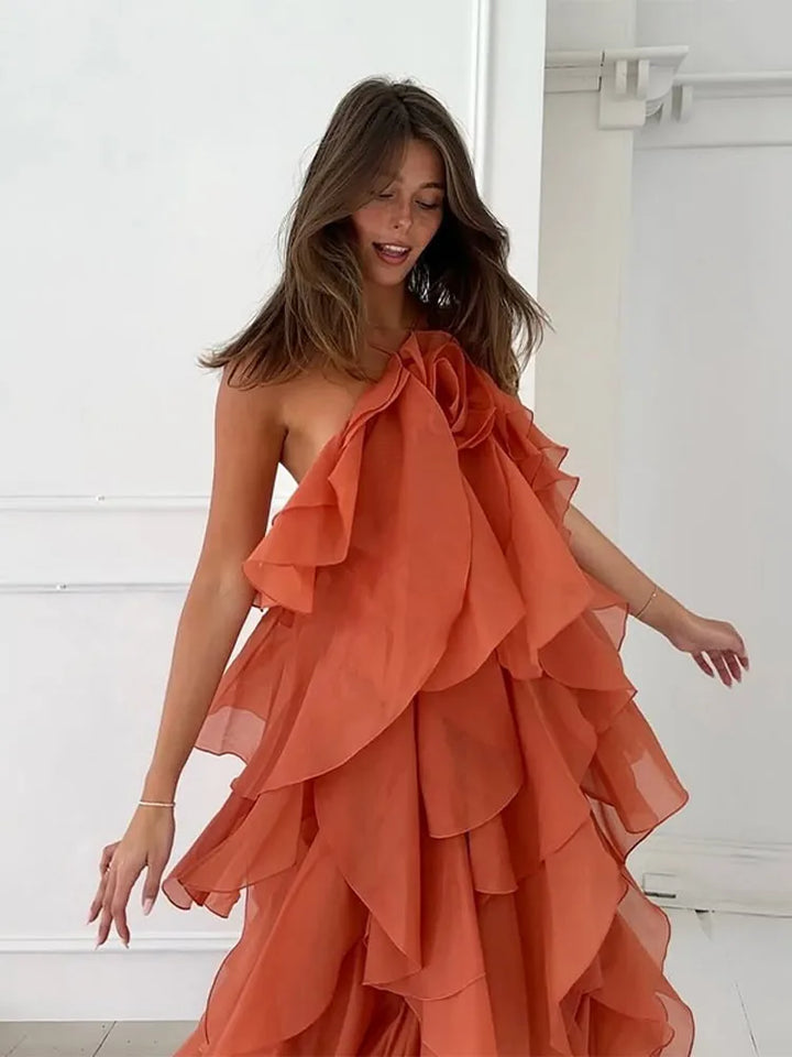 Feminine floral maxi dress with elegant ruffles, ideal for women's summer events, holidays, or beach outings.