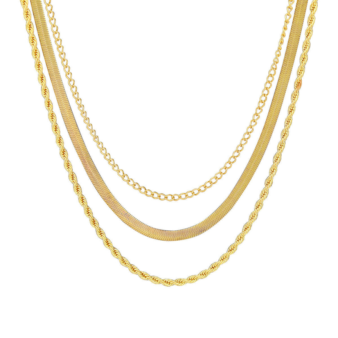 Modern silver layered chain necklace for women, a stylish textured fashion accessory.