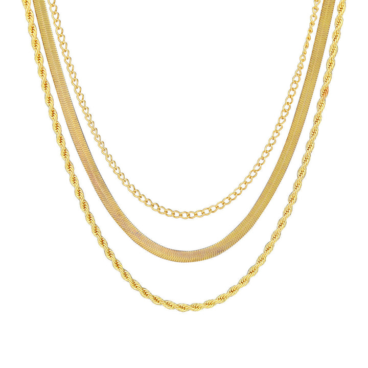 Modern silver layered chain necklace for women, a stylish textured fashion accessory.