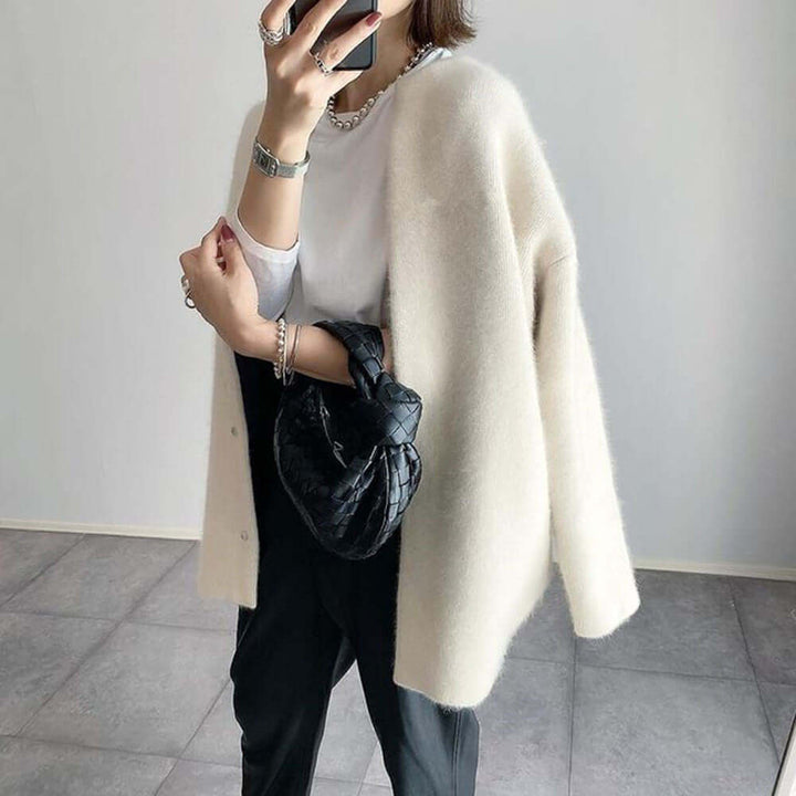 Versatile women's elegant sweater cardigan, designed for chic casual wear and cozy comfort.