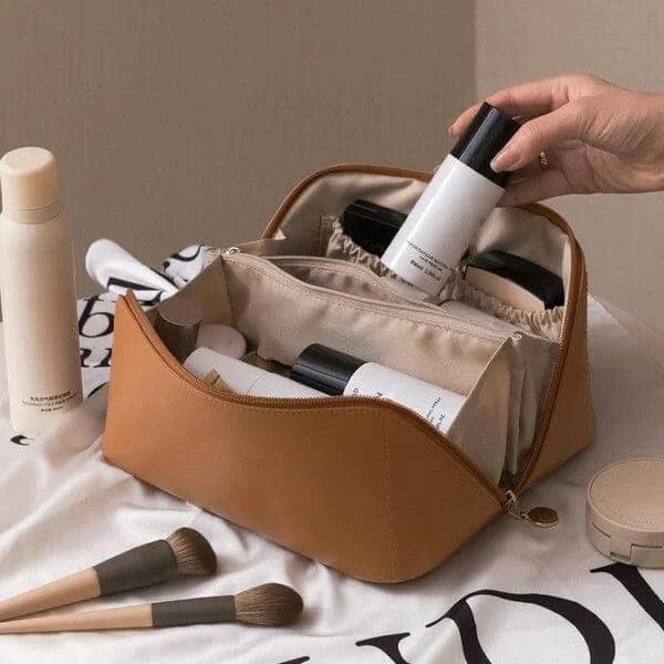 Chic portable leather cosmetic organizer for women, ideal travel accessory for beauty storage.