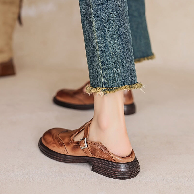 Classic women's leather Mary Janes, T-strap flats for elegant everyday comfort.